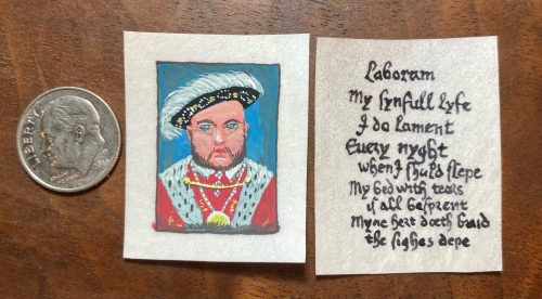 Miniature parchment reproduction of two pages from Anne Boleyn's Girdle Book which never belonged to her. Henry the 8th portrait.